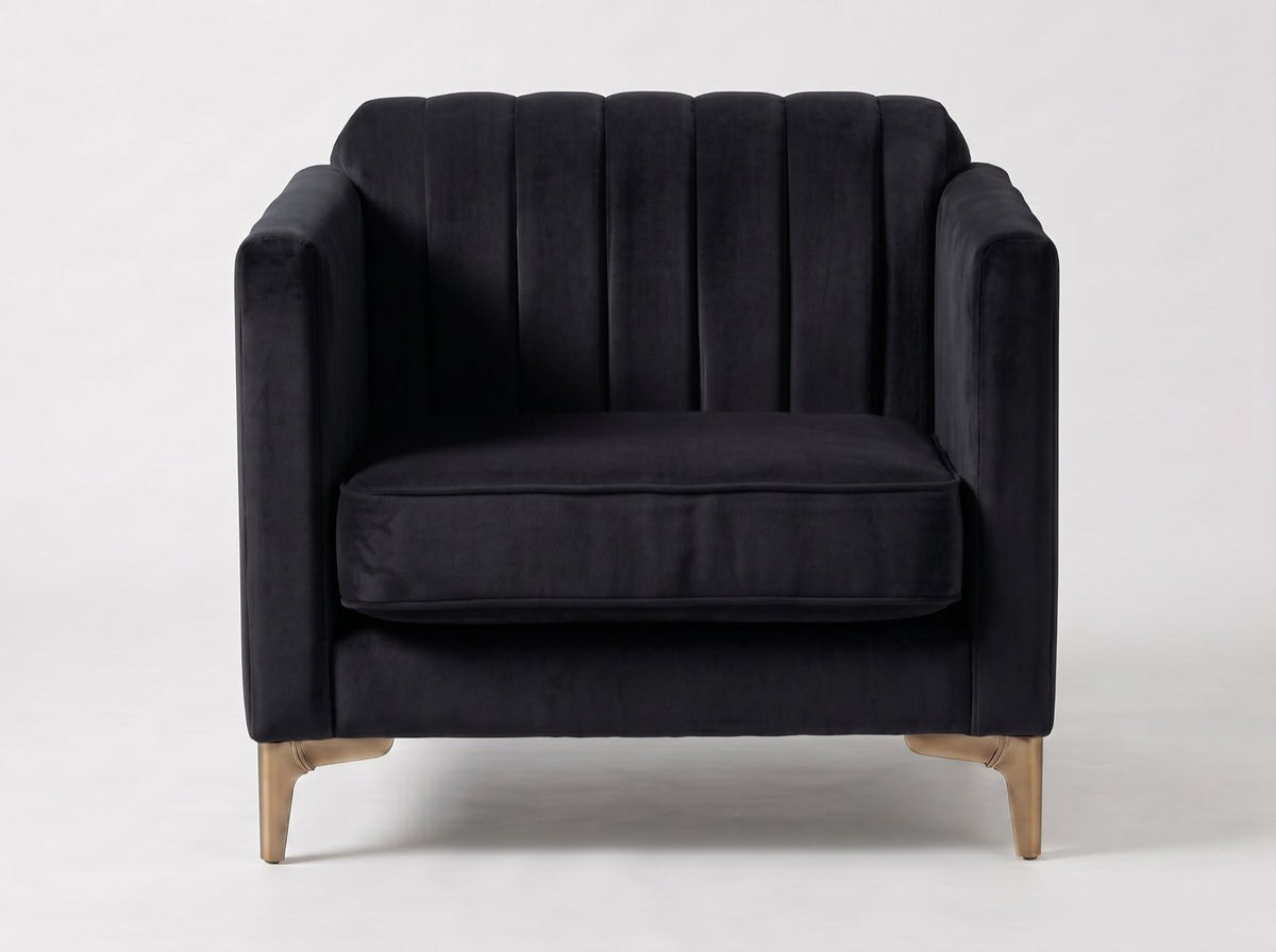 Sillón Mila de un cuerpo en pana antimanchas Black, respaldo acanalado y patas de madera a pedido