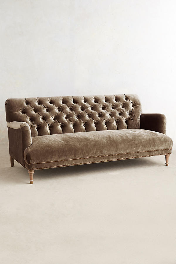 Sillón de tres cuerpos con capitoné marrón