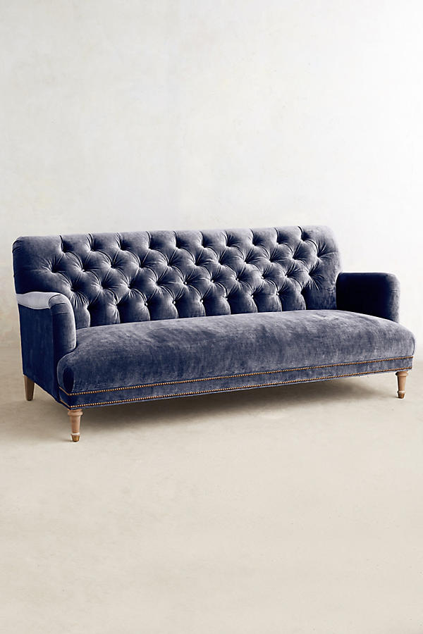 Sillón de tres cuerpos con capitoné violeta