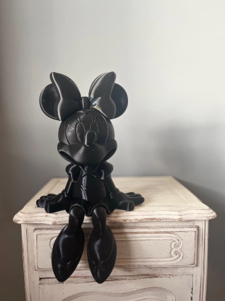 Minnie Disney – Vista lateral de la figura decorativa