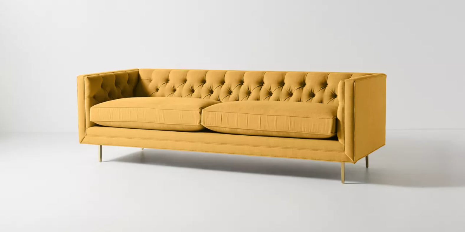 Sillon elegante con botone en el respaldo, cuadrado y sofisticado para cualquier tipo de espacio