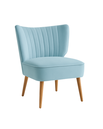Sillón tapizado en azul celeste con respaldo curvo acanalado y patas de madera clara. Perfecto para espacios infantiles o rincones de lectura.