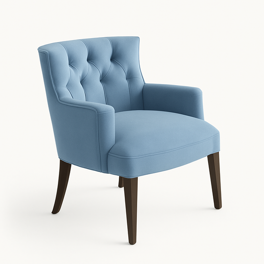 Butaca tapizada en azul con respaldo bajo y apoyabrazos rectos. Sillón moderno ideal para niños o decoración de espacios delicados.