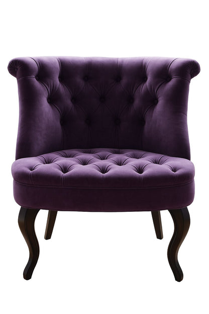 Sillón matero Matilde tapizado en violeta con respaldo capitoné y patas curvas oscuras – Tienda de Banquitos