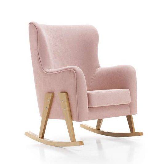 Mecedora tapizada en pana rosa con respaldo alto y base de madera curva.