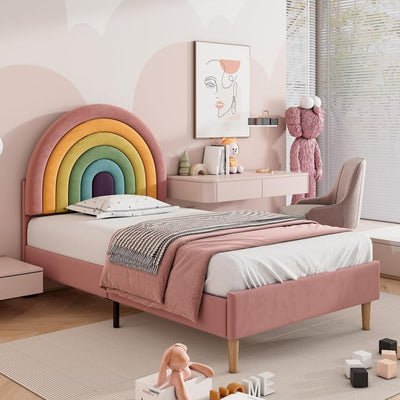 Respaldo de cama infantil con forma de arco iris tapizado.