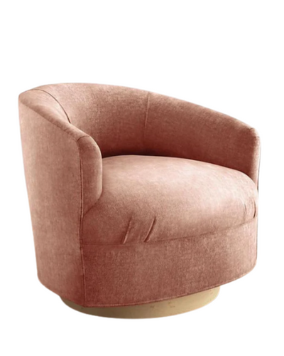 Sillón individual moderno con forma redondeada y base giratoria, tapizado en rosa.