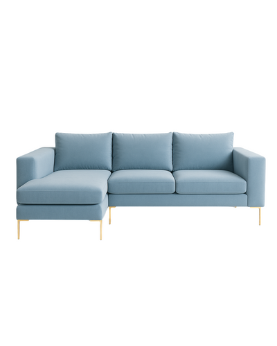 Sillón esquinero moderno en azul celeste con patas doradas, líneas limpias y almohadones sueltos. Estilo nórdico con toque glam.