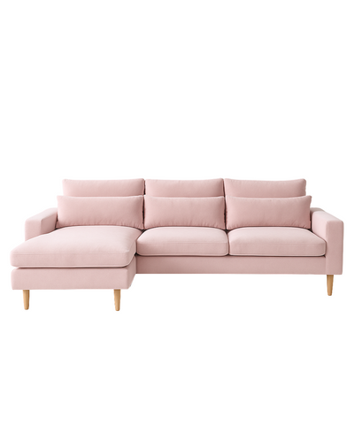 Sillón esquinero en tono rosa pastel con líneas rectas, patas de madera claras y apoyabrazos rectangulares. Ideal para espacios cálidos.