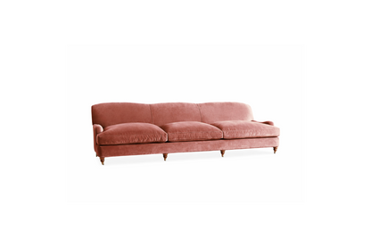 Sofá moderno modelo Minerva, tapizado con respaldo bajo y cojines de gran tamaño, estructura de líneas limpias y patas de madera clara, sobre fondo blanco, perfecto para ambientes minimalistas o espacios amplios y contemporáneos que buscan un toque de sofisticación.