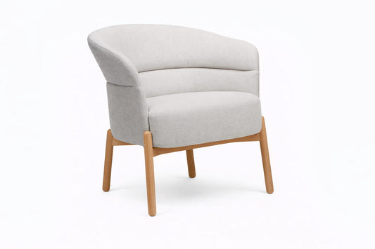 Soft Seating Wally tapizado con respaldo curvo y patas de madera, ideal para recepciones y espacios de espera