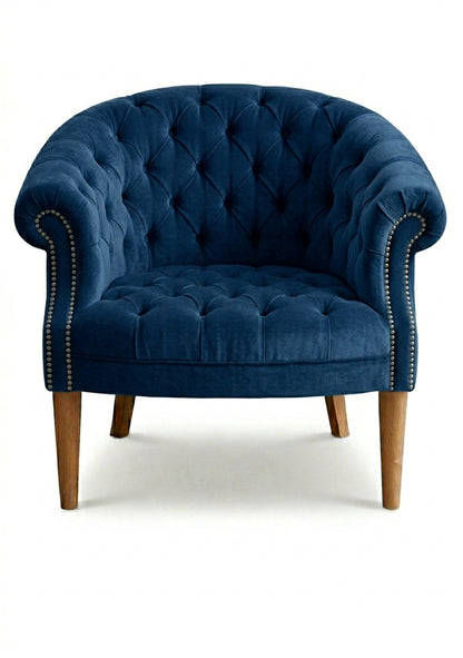Sillón Nairobi de un cuerpo tapizado en azul, capitoné redondeado con tachas y patas de madera – Tienda de Banquitos