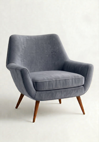 Sillón de un cuerpo Chloe color Onyx en pana antimanchas importada, respaldo curvo envolvente y patas de madera inclinadas de aire retro — ideal para sumar onda vintage al living. Hecho a medida por Tienda de Banquitos.
