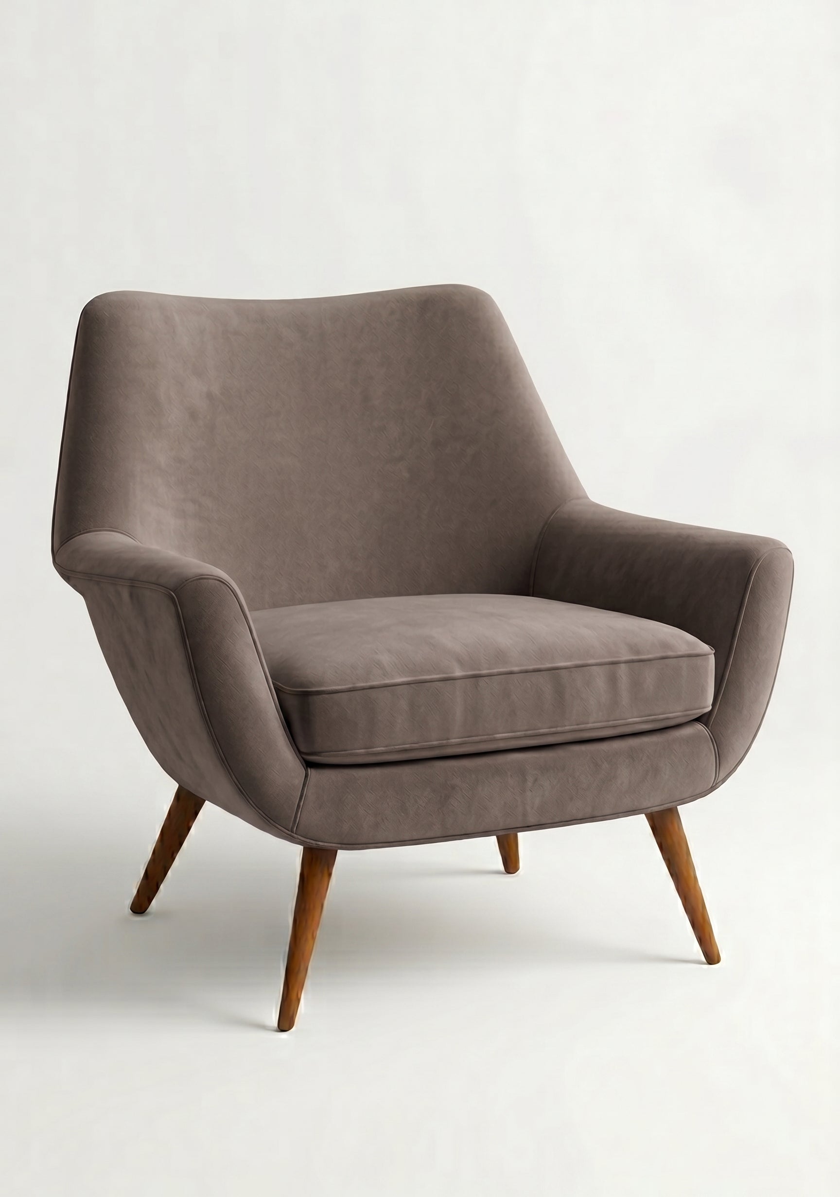 Sillón de un cuerpo Chloe color Stone en pana antimanchas importada, respaldo curvo envolvente y patas de madera inclinadas de aire retro — ideal para sumar onda vintage al living. Hecho a medida por Tienda de Banquitos.