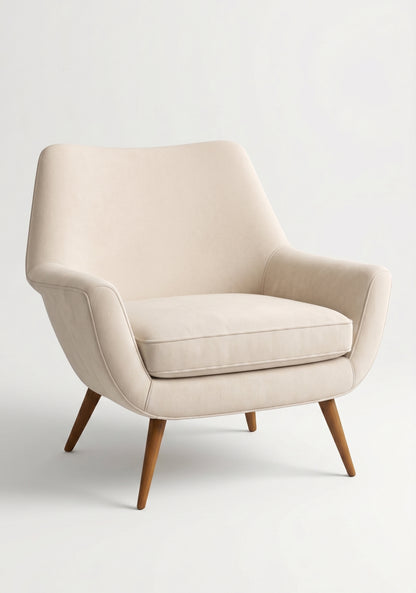 Sillón de un cuerpo Chloe color Vainilla en pana antimanchas importada, respaldo curvo envolvente y patas de madera inclinadas de aire retro — ideal para sumar onda vintage al living. Hecho a medida por Tienda de Banquitos.