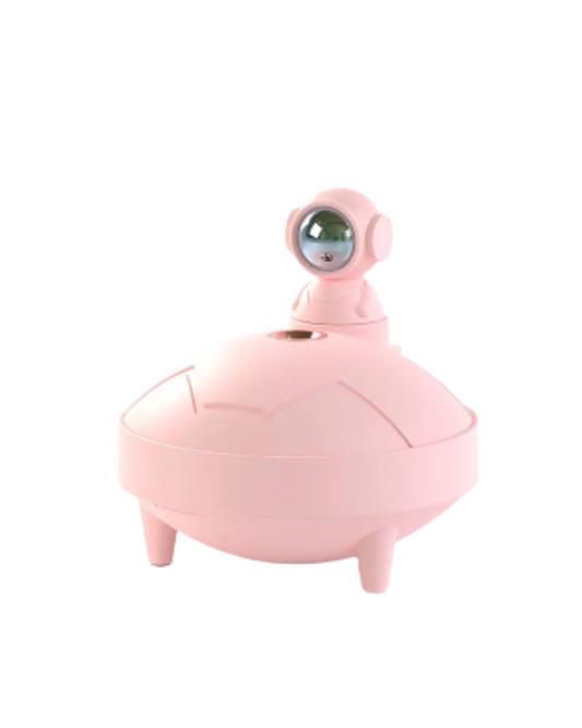 Humidificador astronauta Sunshine rosa sobre base de platillo con patas, vista frontal