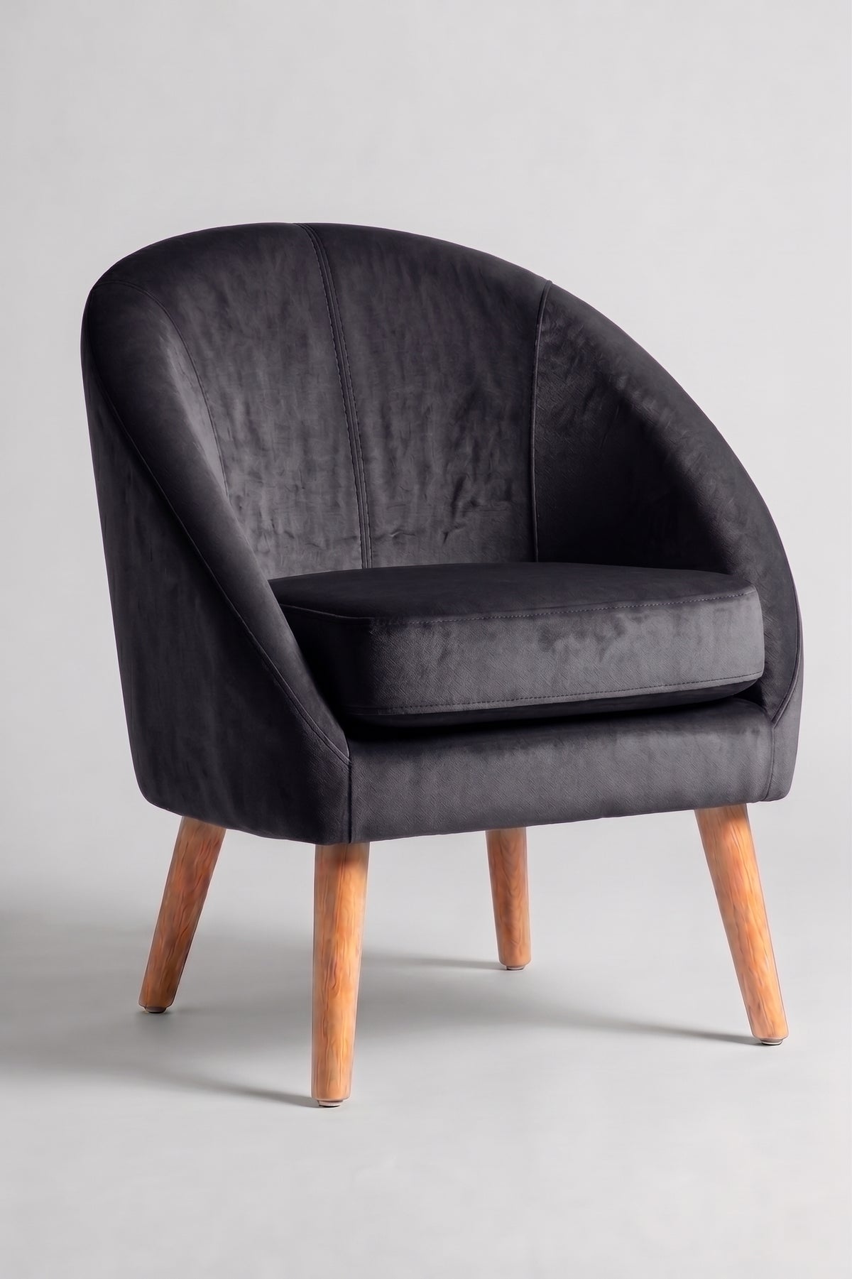 Sillón de un cuerpo Paris color Grafito en pana antimanchas importada, forma redonda y compacta con apoyabrazos integrados — ideal para un living compacto. Hecho a medida por Tienda de Banquitos.