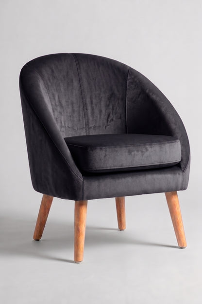 Sillón de un cuerpo Paris color Grafito en pana antimanchas importada, forma redonda y compacta con apoyabrazos integrados — ideal para un living compacto. Hecho a medida por Tienda de Banquitos.