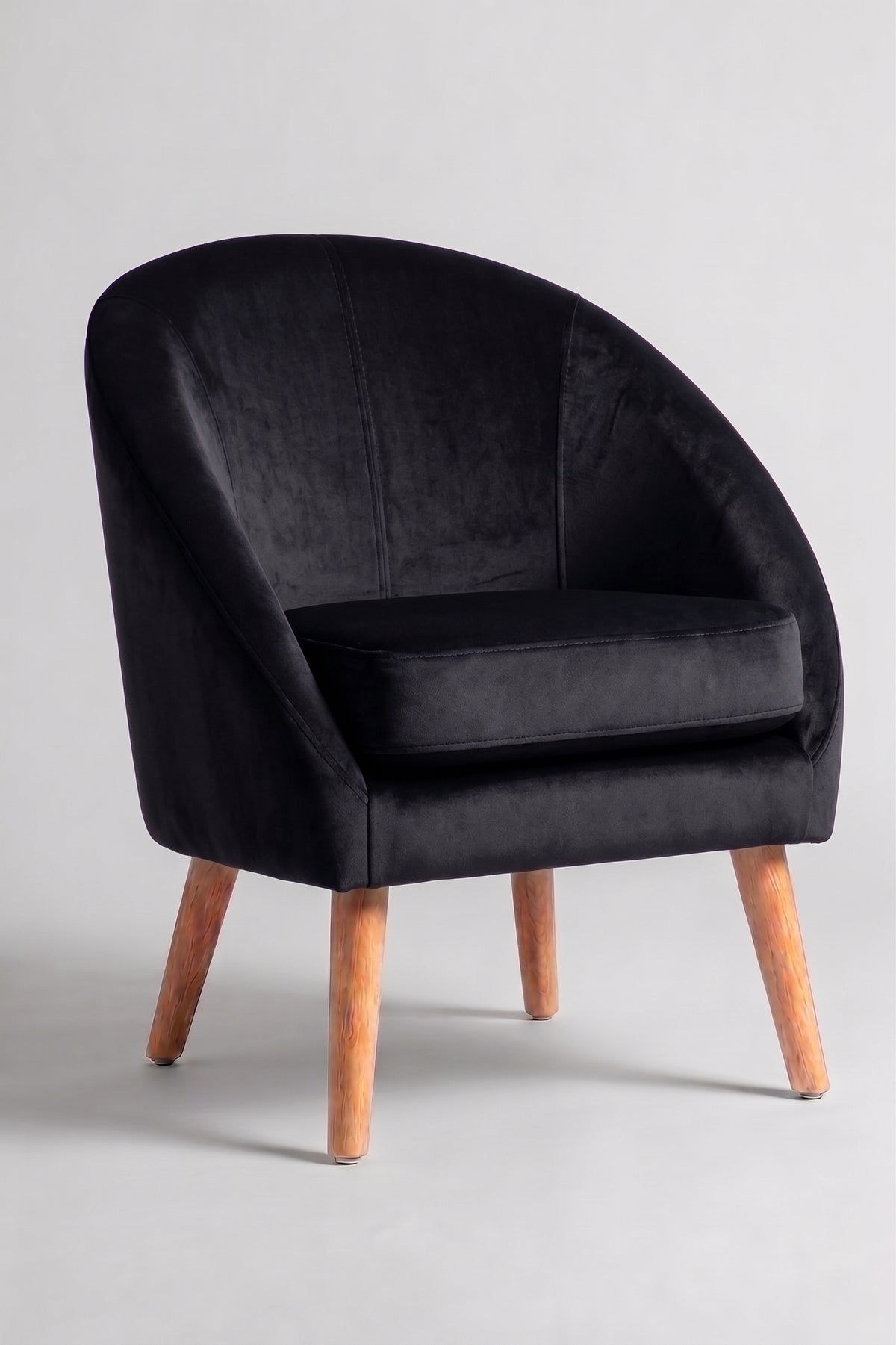 Sillón de un cuerpo Paris color Black en pana antimanchas importada, forma redonda y compacta con apoyabrazos integrados — pensado para espacios chicos o departamentos. Hecho a medida por Tienda de Banquitos.