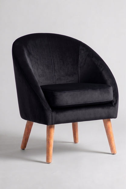 Sillón de un cuerpo Paris color Black en pana antimanchas importada, forma redonda y compacta con apoyabrazos integrados — pensado para espacios chicos o departamentos. Hecho a medida por Tienda de Banquitos.