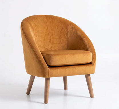Sillón de un cuerpo Paris color Oro en pana antimanchas importada, forma redonda y compacta con apoyabrazos integrados — pensado para espacios chicos o departamentos. Hecho a medida por Tienda de Banquitos.