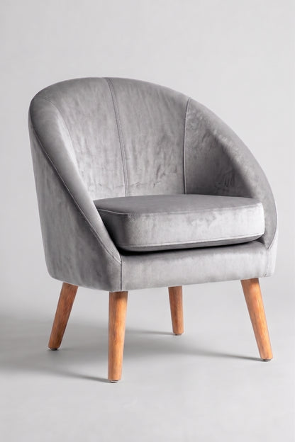 Sillón de un cuerpo Paris color Plata en pana antimanchas importada, forma redonda y compacta con apoyabrazos integrados — pensado para espacios chicos o departamentos. Hecho a medida por Tienda de Banquitos.