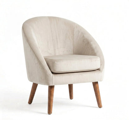 Sillón de un cuerpo Paris color Tiza en pana antimanchas importada, forma redonda y compacta con apoyabrazos integrados — que no ocupe mucho lugar en el living. Hecho a medida por Tienda de Banquitos.