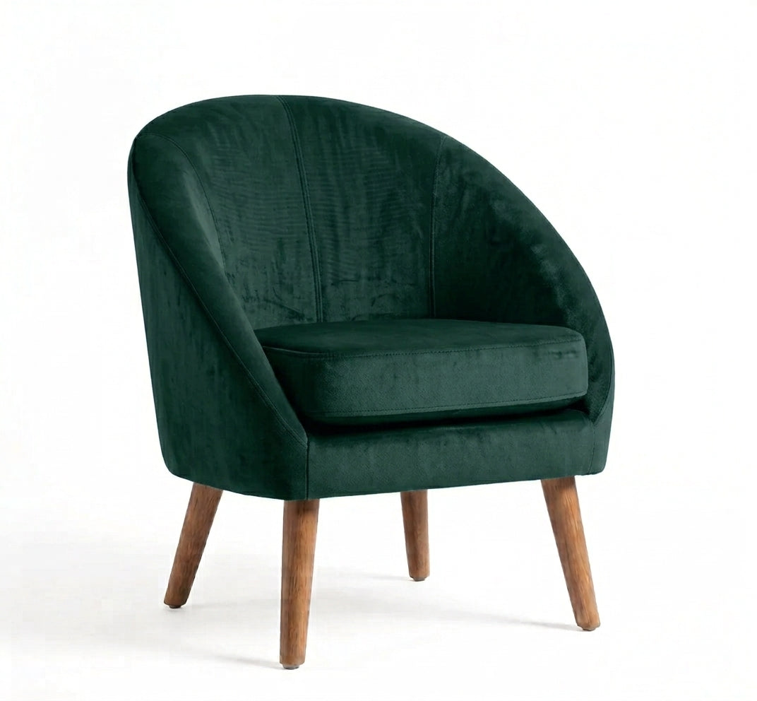 Sillón de un cuerpo Paris color Verde inglés en pana antimanchas importada, forma redonda y compacta con apoyabrazos integrados — pensado para espacios chicos o departamentos. Hecho a medida por Tienda de Banquitos.