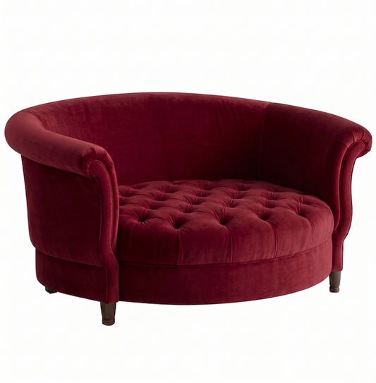 Sillón Brigitte redondo de Tienda de Banquitos tapizado en color bordo, con respaldo curvo envolvente y asiento capitoné