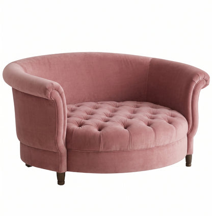Sillón Brigitte redondo de Tienda de Banquitos tapizado en color rosa, con respaldo curvo envolvente y asiento capitoné