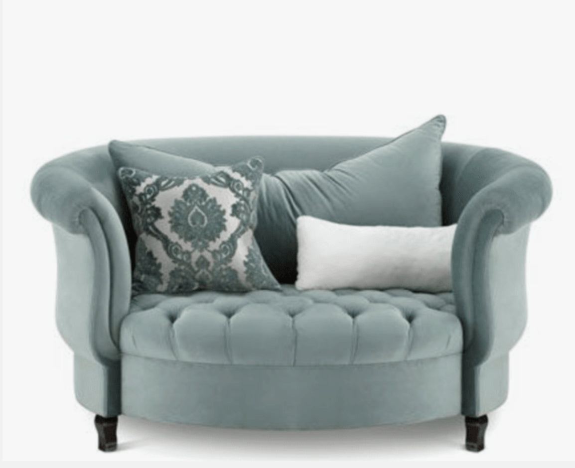 Sillón Brigitte redondo de Tienda de Banquitos tapizado en color verde aqua, con respaldo curvo envolvente y asiento capitoné