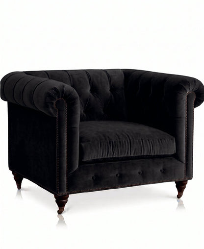 Sillón de un cuerpo Chesterfield color Black en pana antimanchas, el clásico diseño inglés firme con detalle de tachas