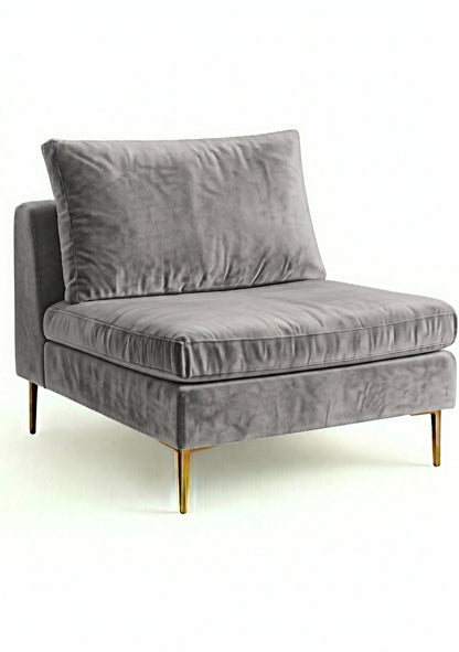 Sillón Edlyn de un cuerpo en color onyx en pana antimanchas, sin apoyabrazos y con patas de aluminio dorado