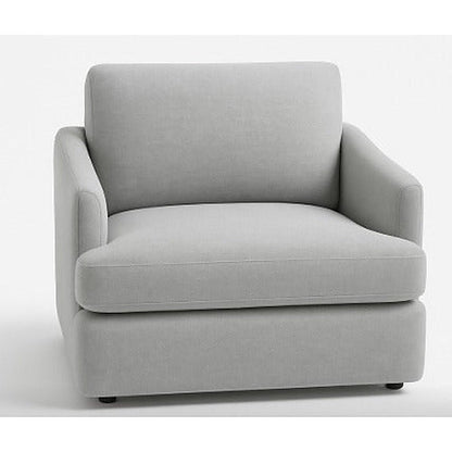 Sillón Elton Línea TDB de un cuerpo en color gris, con estructura de madera maciza y tapizado a medida