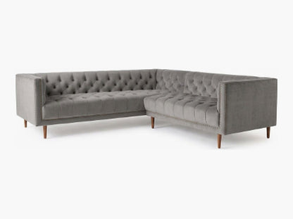 Sillón esquinero Bella Donna en pana antimanchas Onyx, forma en L, capitoné, borde con tachas y patas de madera