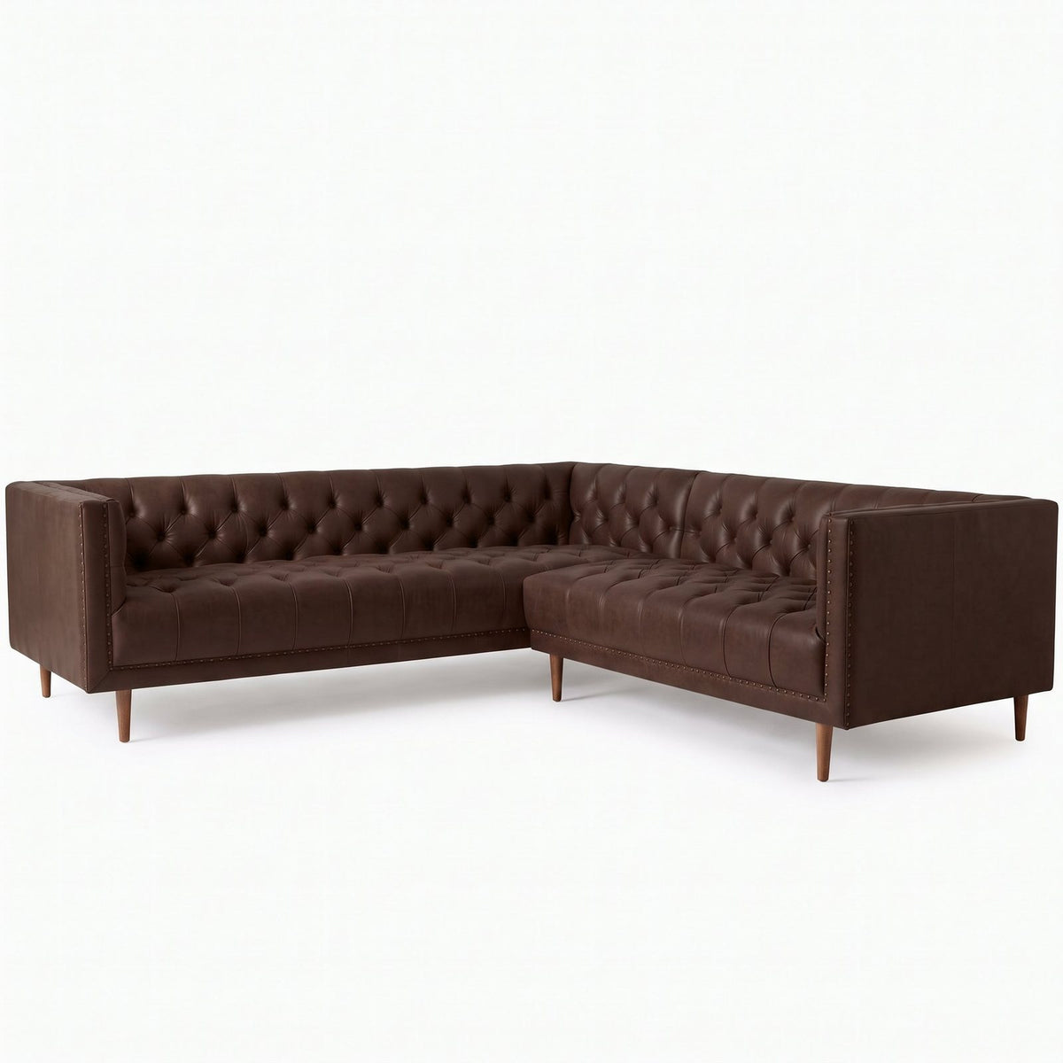 Sillón esquinero Bella Donna en pana antimanchas Suela, forma en L, capitoné, borde con tachas y patas de madera