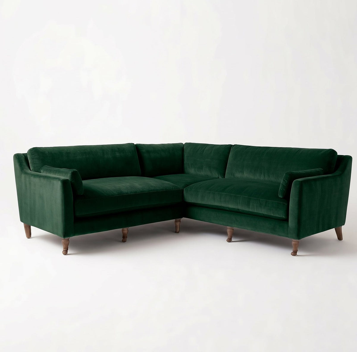 Sillón esquinero Leonelle en pana antimanchas Verde inglés, forma en L, almohadones y patas torneadas de madera