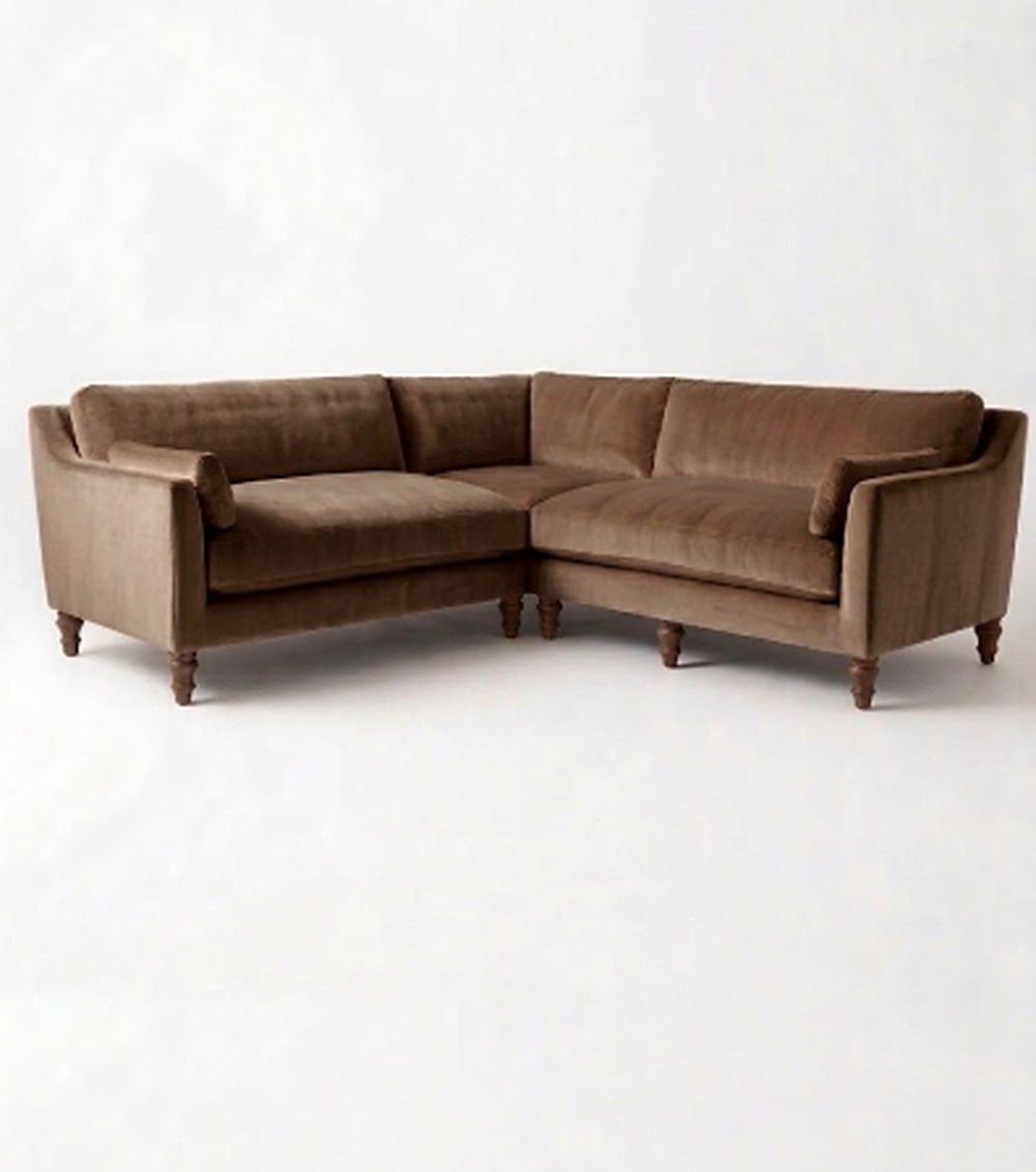 Sillón esquinero Leonelle en pana antimanchas Visón, forma en L, almohadones y patas torneadas de madera