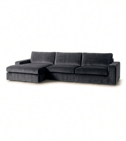 Sillón esquinero Victoria en pana antimanchas Grafito, forma en L con chaise, brazos rectos y almohadones grandes