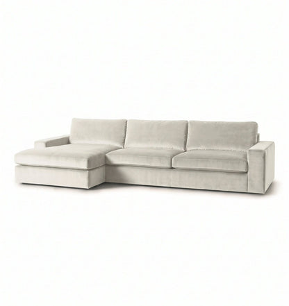 Sillón esquinero Victoria en pana antimanchas Tiza, forma en L con chaise, brazos rectos y almohadones grandes