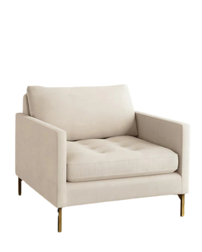 Sillón Ristretto Línea TDB crema, con asiento capitoné y patas de aluminio dorado