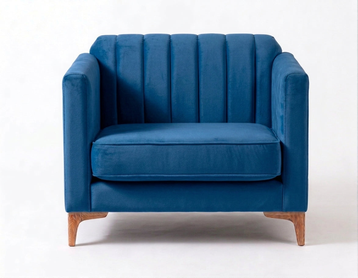Sillón de un cuerpo Mila color Océano en pana antimanchas importada, líneas rectas y diseño moderno con patas doradas — el detalle distinto para un living contemporáneo. Hecho a medida por Tienda de Banquitos.
