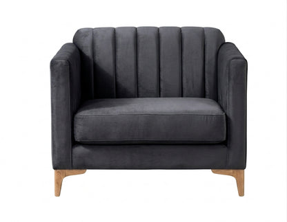Sillón de un cuerpo Mila color Onyx en pana antimanchas importada, líneas rectas y diseño moderno con patas doradas — un clásico contemporáneo para el living. Hecho a medida por Tienda de Banquitos.