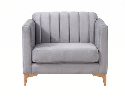 Sillón de un cuerpo Mila color Plata en pana antimanchas importada, líneas rectas y diseño moderno con patas doradas — ideal para sumar un detalle contemporáneo al living. Hecho a medida por Tienda de Banquitos.