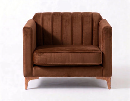 Sillón de un cuerpo Mila color Suela en pana antimanchas importada, líneas rectas y diseño moderno con patas doradas — un clásico contemporáneo para el living. Hecho a medida por Tienda de Banquitos.