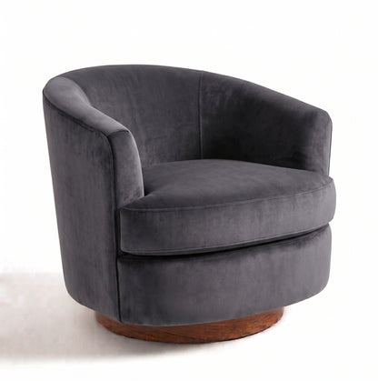 Sillón Rosaura de un cuerpo, forma redondeada y compacta, tapizado en pana antimanchas color Onyx