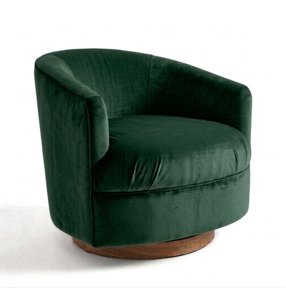 Sillón Rosaura de un cuerpo, forma redondeada y compacta, tapizado en pana antimanchas color Verde inglés