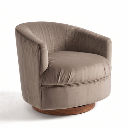 Sillón Rosaura de un cuerpo, forma redondeada y compacta, tapizado en pana antimanchas color Visón
