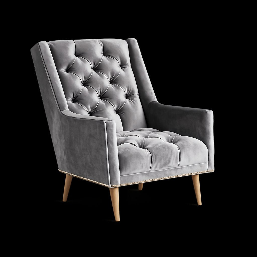Sillón Velvet capitoné de un cuerpo tapizado en gris, con tachas doradas y patas de madera, sobre fondo blanco – Tienda de Banquitos