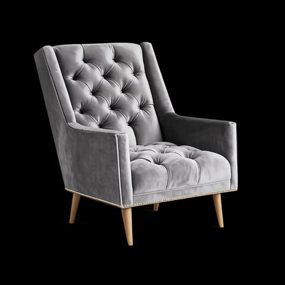 Sillón Velvet capitoné de un cuerpo tapizado en gris, con tachas doradas y patas de madera, sobre fondo blanco – Tienda de Banquitos